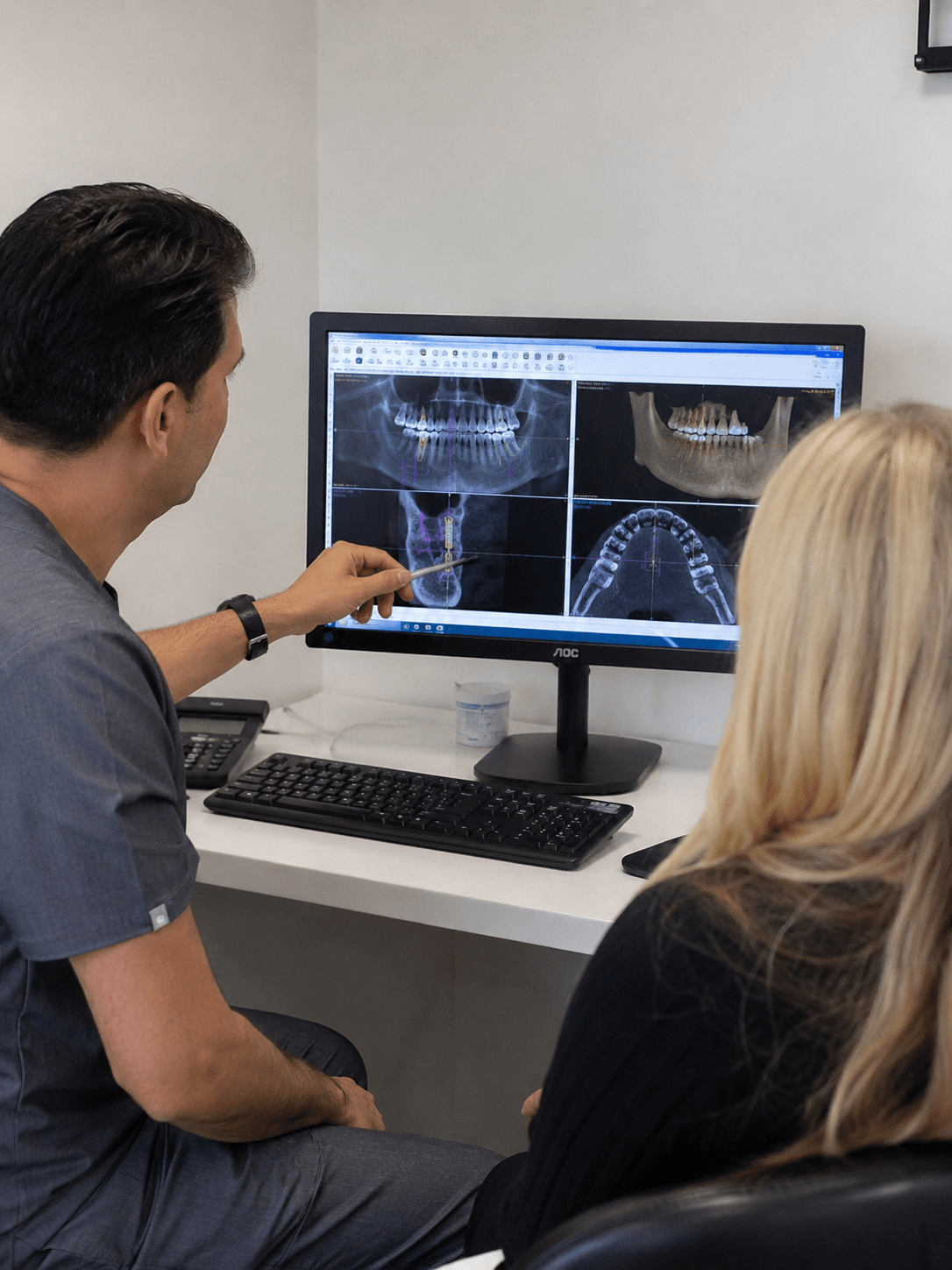 Dr Ali explaining a CBCT scan at Dulwich Dental Centre